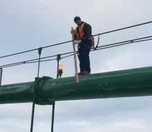 MBA steeplejack knocking ice off Feb. 25, 2018